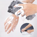 Serviette de bain exfoliante